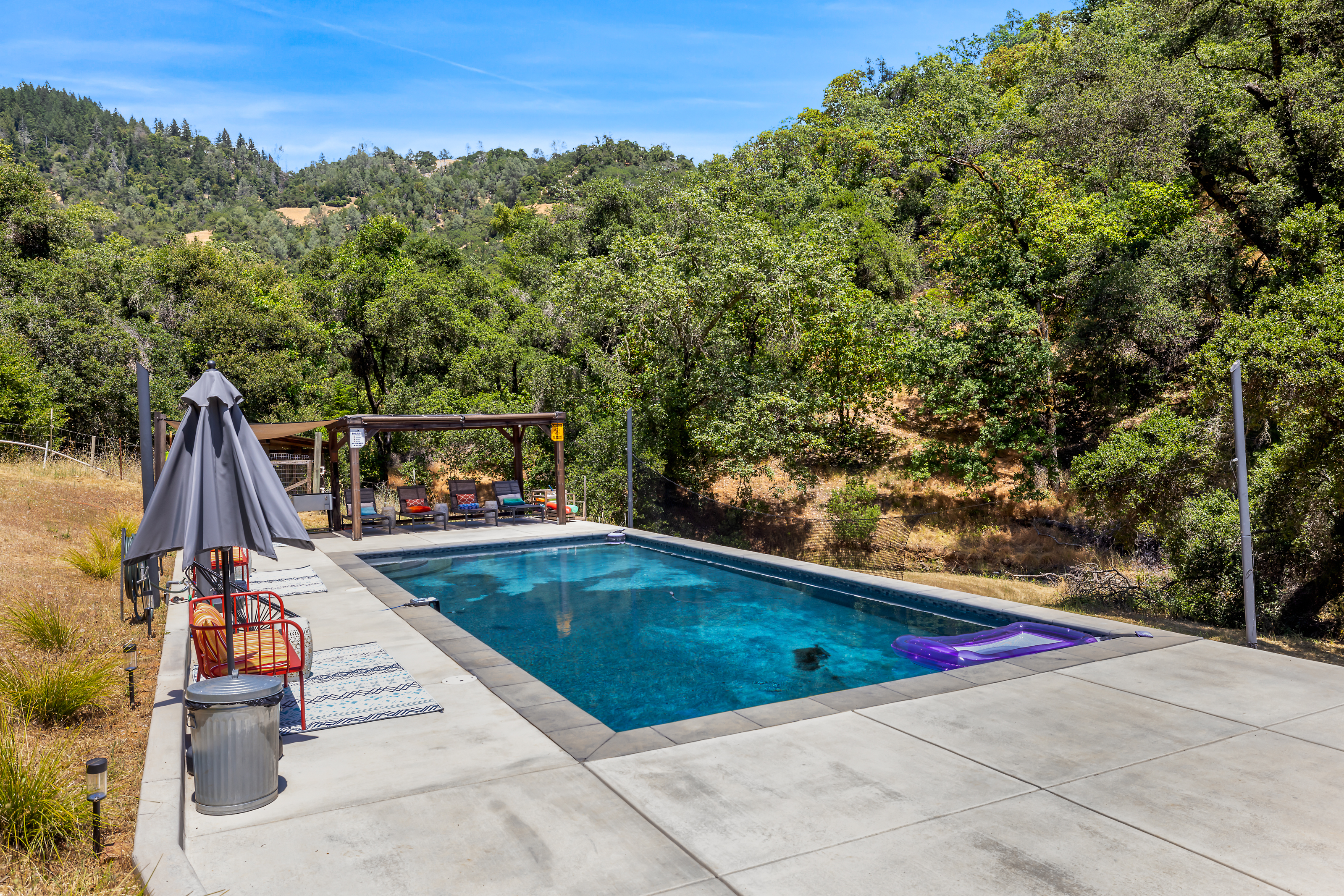 Pool with mountain views and pergola